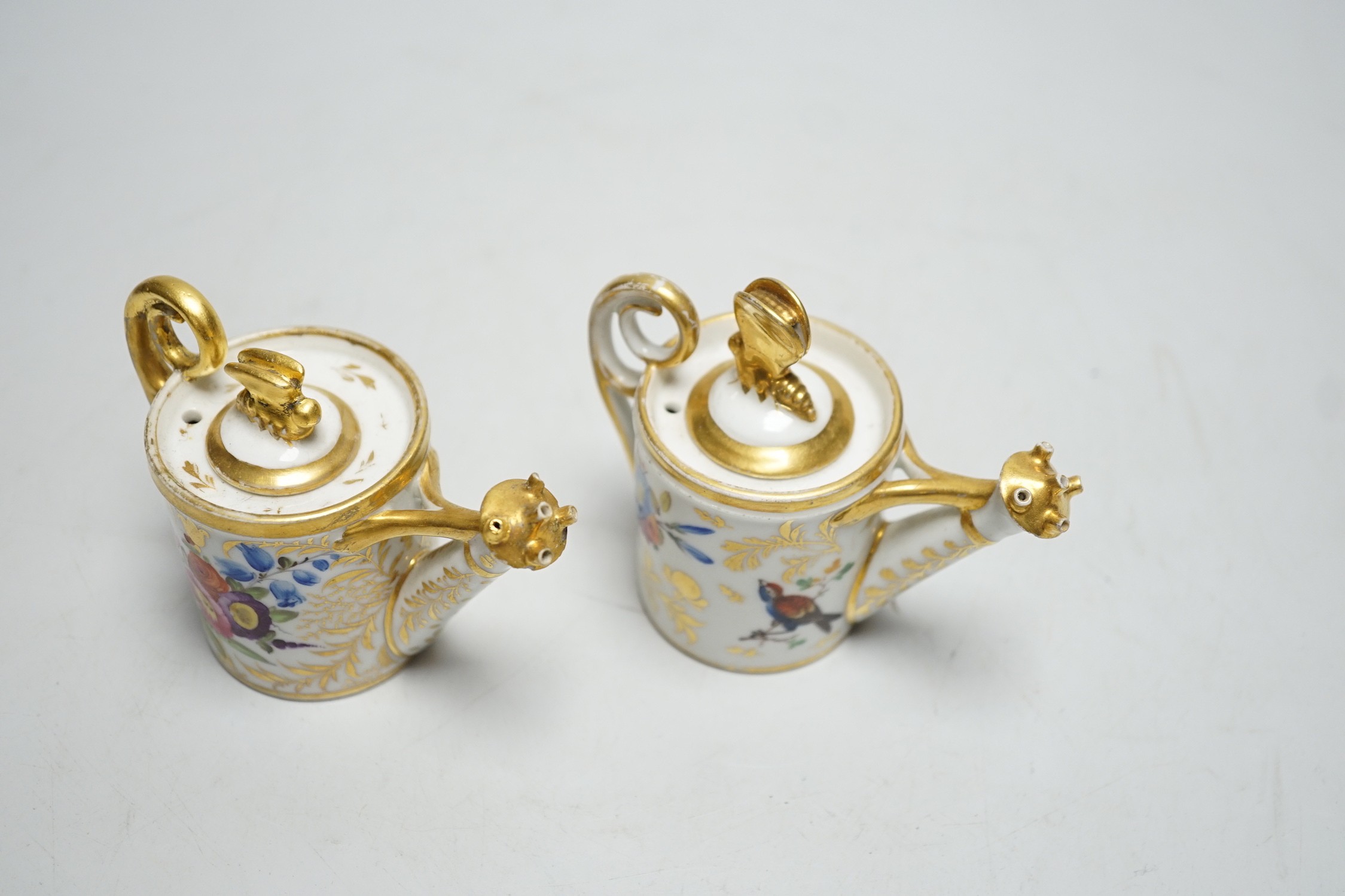 Toy porcelain: Two English porcelain rosewater sprinklers, c.1810, possibly Coalport, each modelled in the form of a watering can